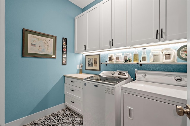 4801 Park View Pl, Arlington, TX 76005 - laundry area with baseboards, light tile patterned floors, washer and dryer, and cabinet space