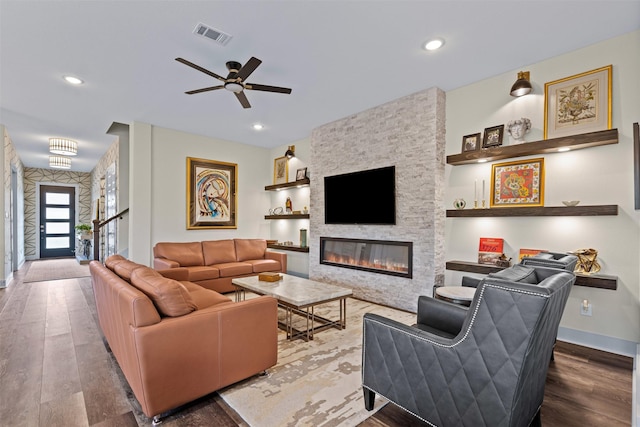 4801 Park View Pl, Arlington, TX 76005 - living room with a fireplace, wood finished floors, a ceiling fan, and visible vents