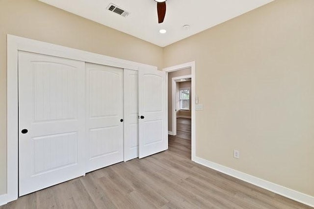 1301 N Sylvania Ave, Fort Worth, TX 76111 - unfurnished bedroom featuring baseboards, visible vents, light wood-style floors, and a closet