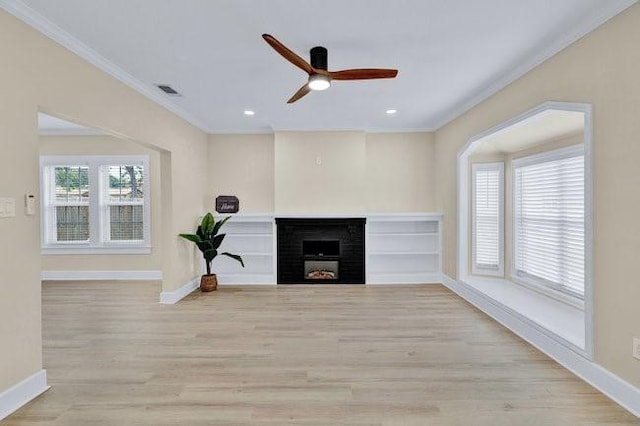 1301 N Sylvania Ave, Fort Worth, TX 76111 - unfurnished living room with a fireplace, a ceiling fan, baseboards, ornamental molding, and wood finished floors