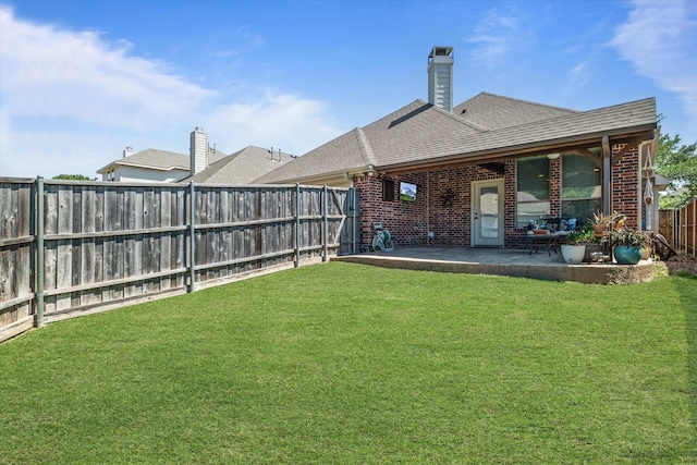 exterior space featuring a patio area and a fenced backyard