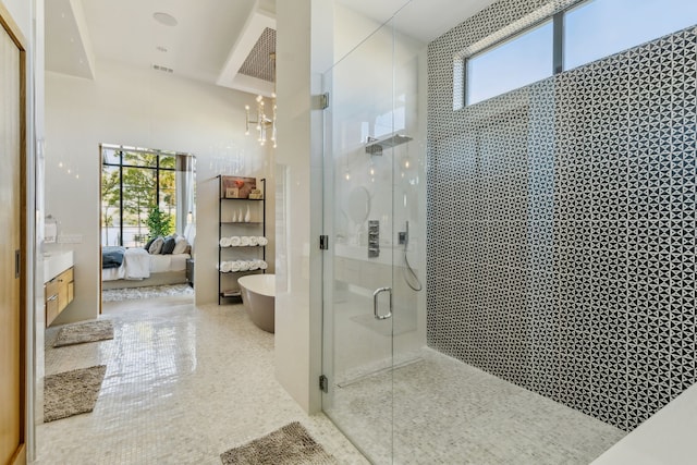 full bath featuring a stall shower, visible vents, a wealth of natural light, and ensuite bathroom