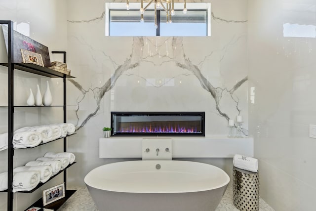 12133 W Lighthouse Ln, Malakoff, TX 75148 - bathroom featuring a freestanding bath, a high end fireplace, and plenty of natural light