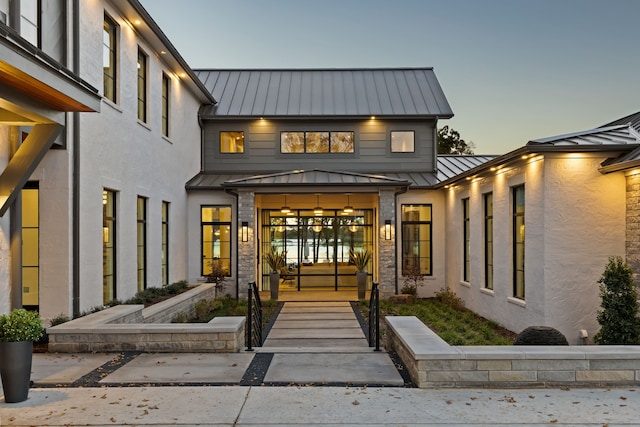 property entrance with a standing seam roof and metal roof