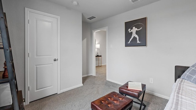 bedroom featuring baseboards, visible vents, and carpet flooring