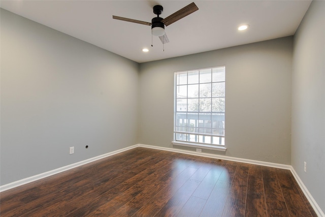 unfurnished room featuring baseboards, recessed lighting, ceiling fan, and dark wood-type flooring