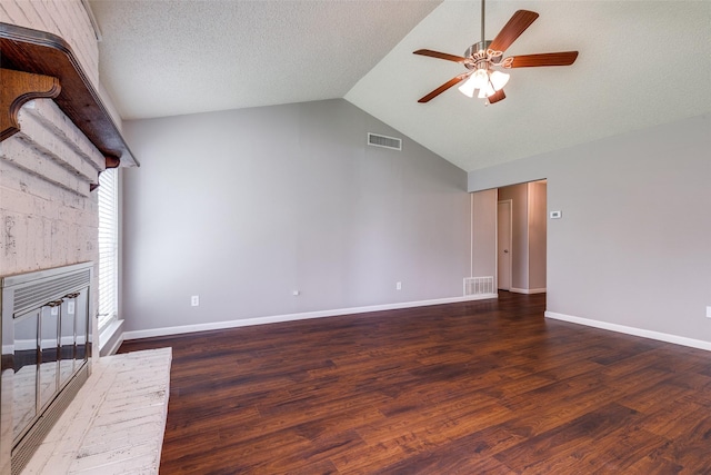 unfurnished living room featuring wood finished floors, visible vents, ceiling fan, and vaulted ceiling