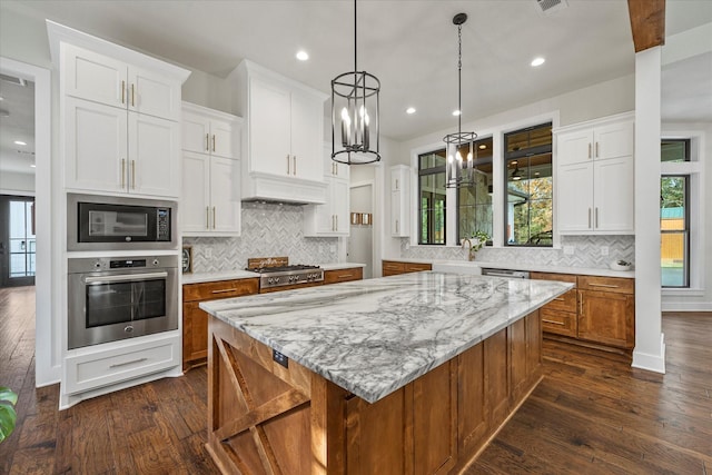502 Vz County Road 1915, Fruitvale, TX 75127 - kitchen with dark wood-style flooring, white cabinets, stainless steel appliances, and plenty of natural light