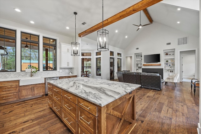 502 Vz County Road 1915, Fruitvale, TX 75127 - kitchen featuring visible vents, white cabinets, a wealth of natural light, and beam ceiling