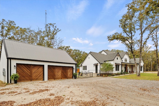 502 Vz County Road 1915, Fruitvale, TX 75127 - modern farmhouse style home featuring an outbuilding, a detached garage, metal roof, and fence