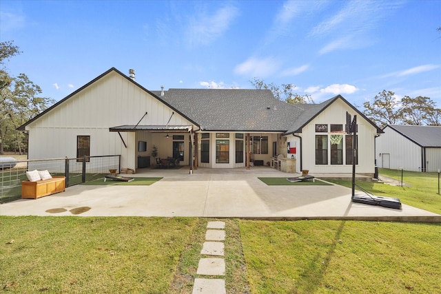 502 Vz County Road 1915, Fruitvale, TX 75127 - rear view of property featuring a patio, a lawn, a shingled roof, and fence