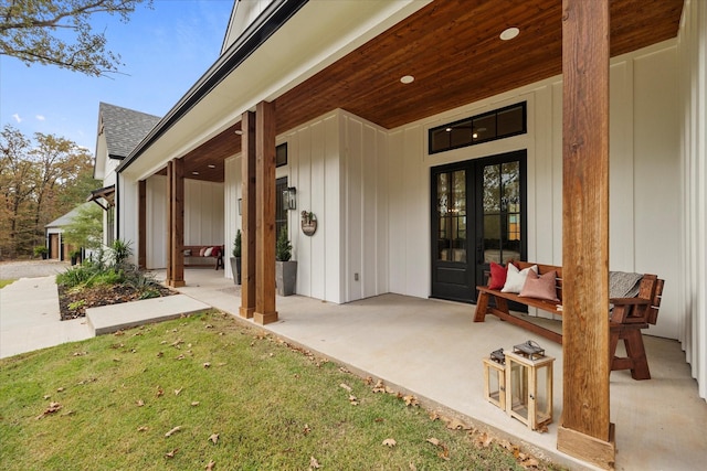 502 Vz County Road 1915, Fruitvale, TX 75127 - doorway to property featuring board and batten siding, a yard, french doors, and roof with shingles
