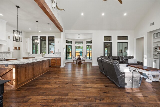 502 Vz County Road 1915, Fruitvale, TX 75127 - living room featuring visible vents, dark wood-style floors, recessed lighting, vaulted ceiling, and ceiling fan with notable chandelier