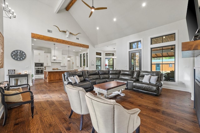 502 Vz County Road 1915, Fruitvale, TX 75127 - living area featuring dark wood finished floors, beamed ceiling, ceiling fan with notable chandelier, visible vents, and high vaulted ceiling