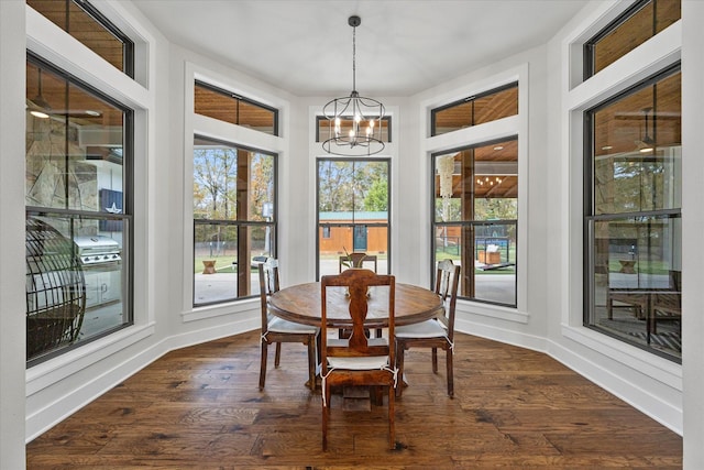 502 Vz County Road 1915, Fruitvale, TX 75127 - dining area featuring an inviting chandelier, dark wood-style floors, and baseboards