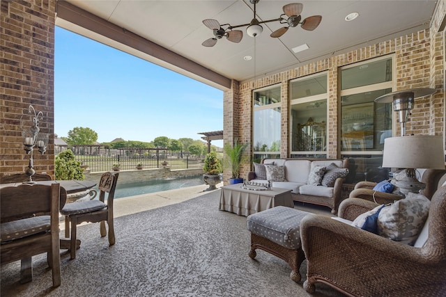 3429 Lochside, The Colony, TX 75056 - sunroom / solarium featuring carpet floors and brick wall