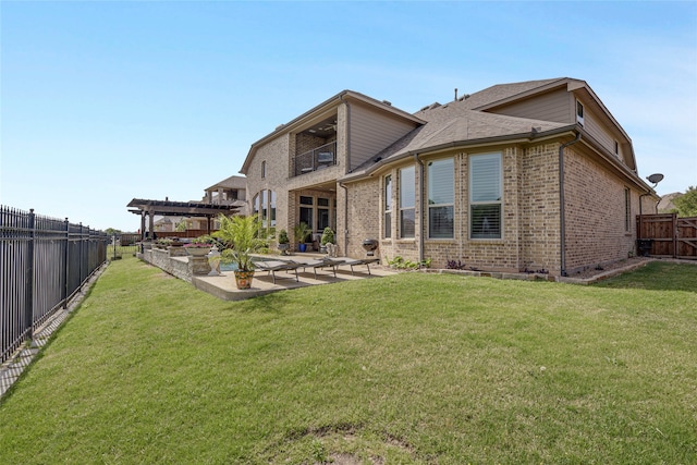 3429 Lochside, The Colony, TX 75056 - back of house featuring a fenced backyard, brick siding, a patio area, a balcony, and a pergola