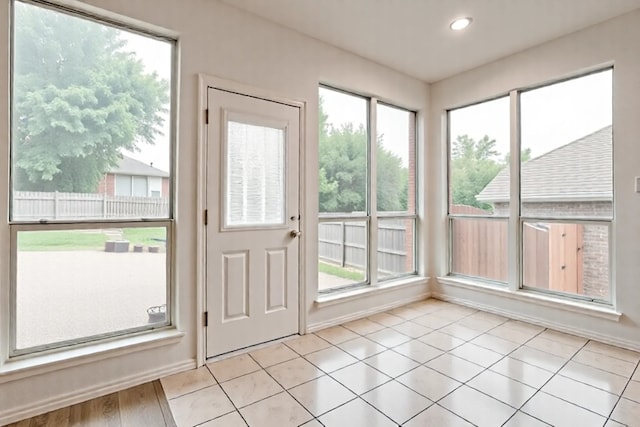 1415 Lowes Farm Pkwy, Mansfield, TX 76063 - doorway to outside with baseboards and recessed lighting