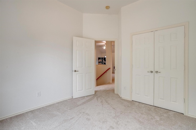 1415 Lowes Farm Pkwy, Mansfield, TX 76063 - unfurnished bedroom with light carpet and a closet