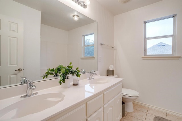 1415 Lowes Farm Pkwy, Mansfield, TX 76063 - full bath with plenty of natural light, double vanity, and tile patterned flooring