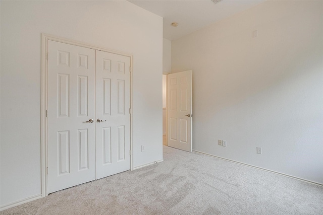 1415 Lowes Farm Pkwy, Mansfield, TX 76063 - unfurnished bedroom featuring carpet flooring and a closet