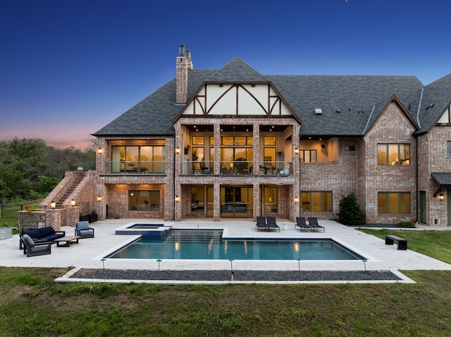 3110 High Rd, Flower Mound, TX 75022 - back of property with a balcony, an outdoor hangout area, a patio, and a chimney