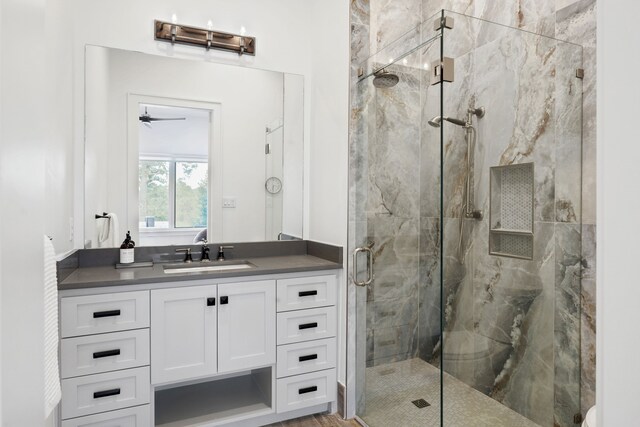 3110 High Rd, Flower Mound, TX 75022 - bathroom featuring a marble finish shower, vanity, and ceiling fan