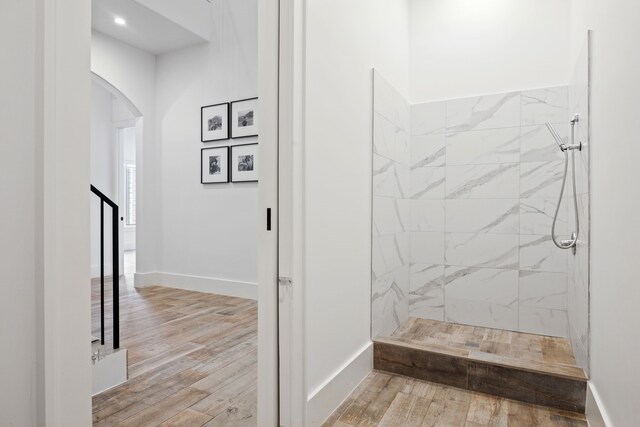 3110 High Rd, Flower Mound, TX 75022 - bathroom with tiled shower, wood finished floors, baseboards, and recessed lighting