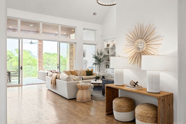 3110 High Rd, Flower Mound, TX 75022 - living room with high vaulted ceiling and wood finished floors