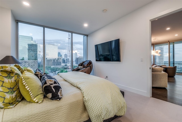 3130 N Harwood St Unit 901, Dallas, TX 75201 - carpeted bedroom with baseboards, access to outside, recessed lighting, and expansive windows
