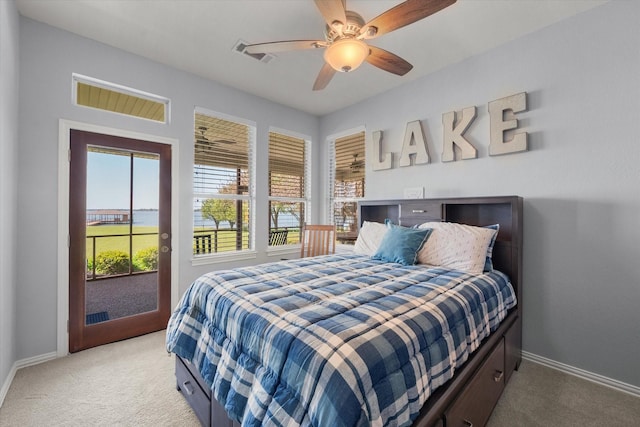 411 Pecan Point Dr, Kerens, TX 75144 - bedroom with light colored carpet, baseboards, and access to outside