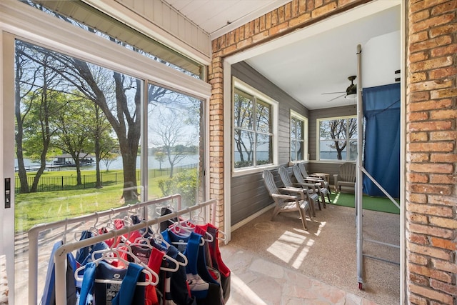 411 Pecan Point Dr, Kerens, TX 75144 - sunroom / solarium featuring a ceiling fan and a water view