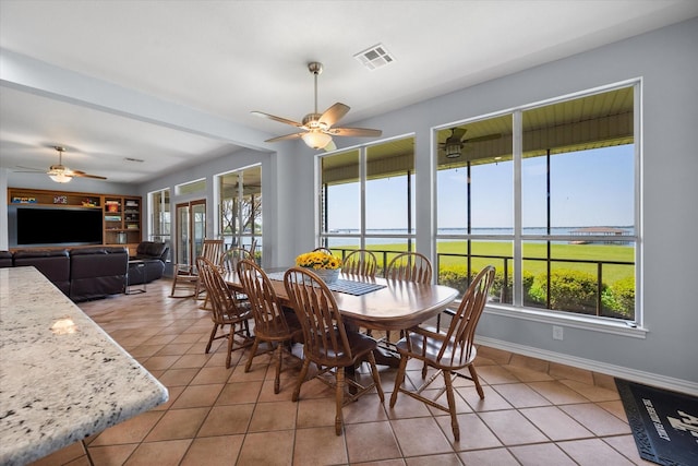 411 Pecan Point Dr, Kerens, TX 75144 - dining area with a ceiling fan, visible vents, and a healthy amount of sunlight