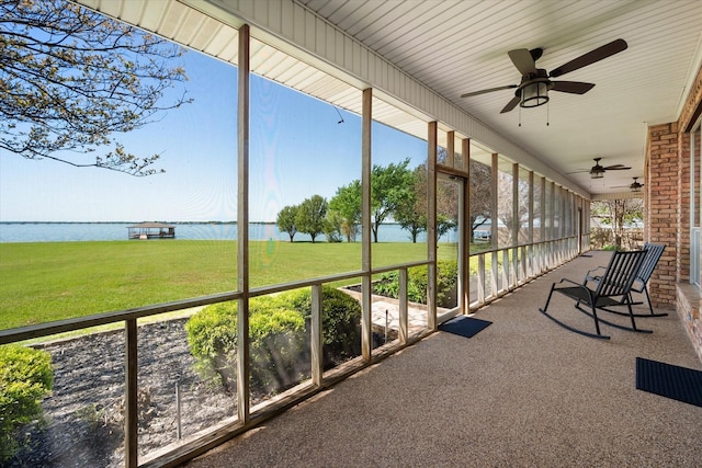 411 Pecan Point Dr, Kerens, TX 75144 - unfurnished sunroom with a water view and a ceiling fan