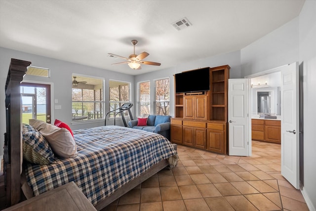 411 Pecan Point Dr, Kerens, TX 75144 - bedroom with light tile patterned floors, ceiling fan, and visible vents