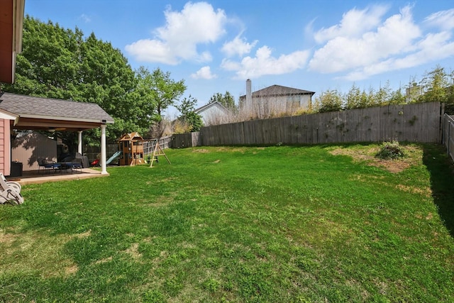 10313 Gray Oak Ln, Fort Worth, TX 76108 - view of yard with a fenced backyard, a playground, and a patio area