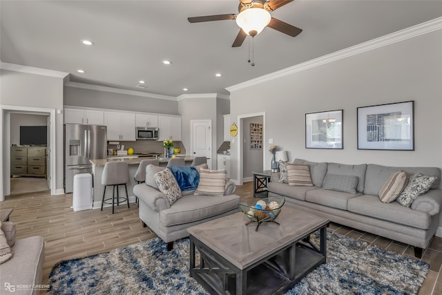 3843 Joseph Randall Dr, Shreveport, LA 71107 - living area featuring baseboards, recessed lighting, light wood finished floors, ornamental molding, and a ceiling fan