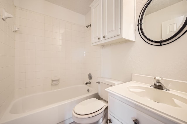 bathroom with toilet, bathing tub / shower combination, and vanity