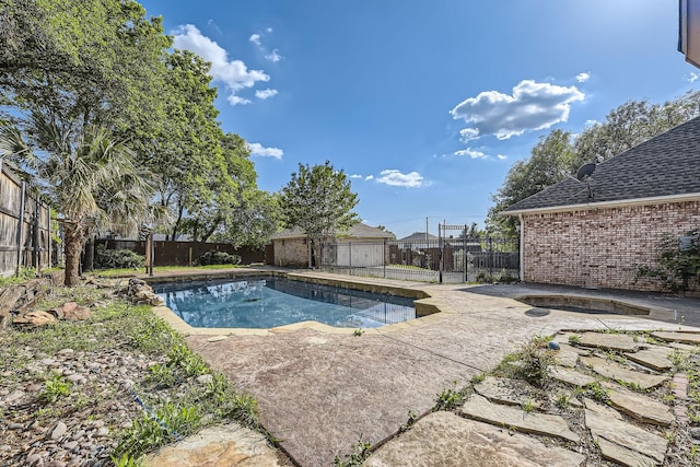 view of swimming pool with a fenced backyard, a fenced in pool, and a patio area