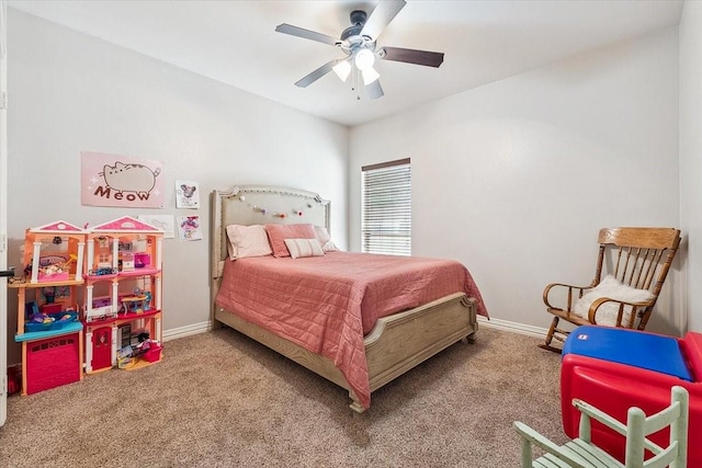 carpeted bedroom featuring ceiling fan and baseboards
