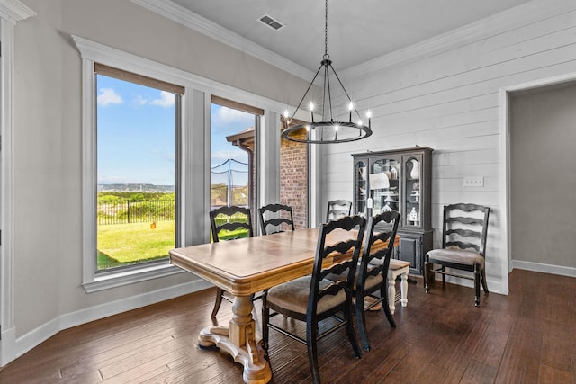 150 Cherokee Hills Ln, Abilene, TX 79606 - dining space with baseboards, a chandelier, ornamental molding, dark wood-style floors, and visible vents