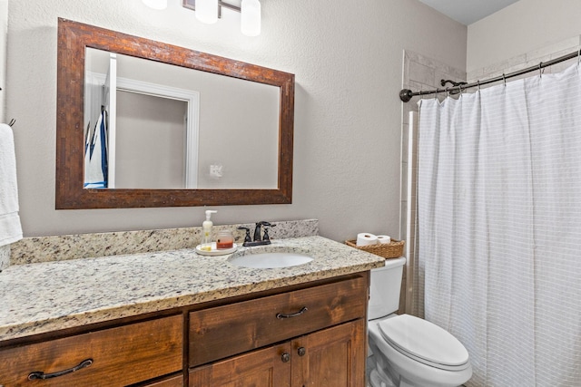150 Cherokee Hills Ln, Abilene, TX 79606 - bathroom with a shower with shower curtain, toilet, a textured wall, and vanity