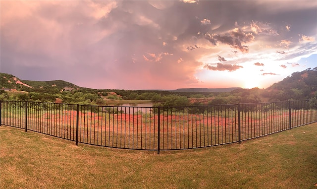 150 Cherokee Hills Ln, Abilene, TX 79606 - view of yard with fence and a water and mountain view