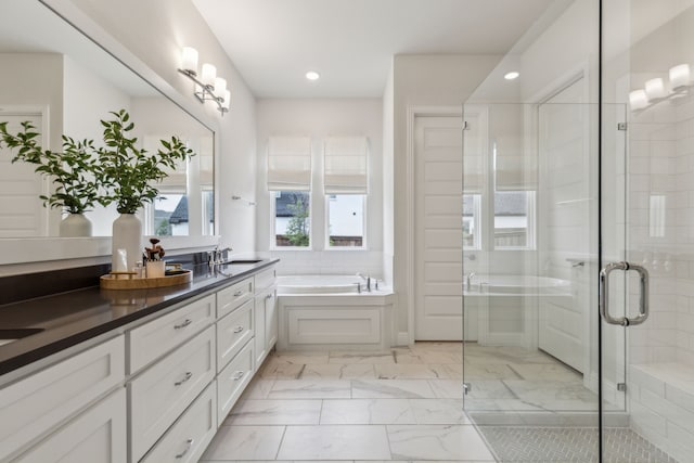14000 Walsh Ave, Fort Worth, TX 76008 - bathroom with a garden tub, marble look tiles, a stall shower, double vanity, and recessed lighting