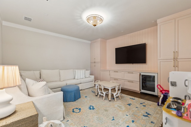 14000 Walsh Ave, Fort Worth, TX 76008 - living room with wine cooler, wood finished floors, and ornamental molding