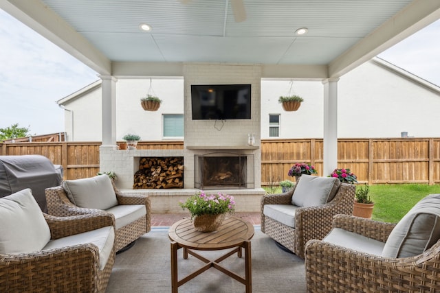 14000 Walsh Ave, Fort Worth, TX 76008 - view of patio with fence and an outdoor living space with a fireplace