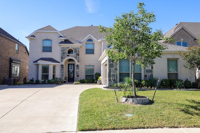 222 Crestview Dr, Midlothian, TX 76065 - view of front of home with brick siding, a front lawn, and concrete driveway