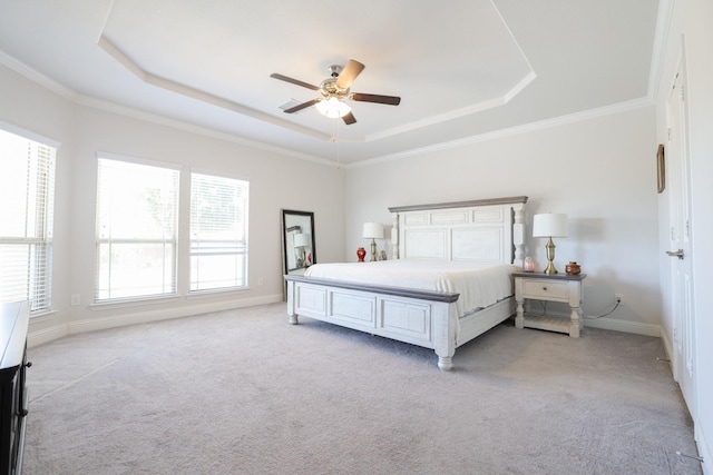 222 Crestview Dr, Midlothian, TX 76065 - bedroom with crown molding, light carpet, baseboards, ceiling fan, and a tray ceiling