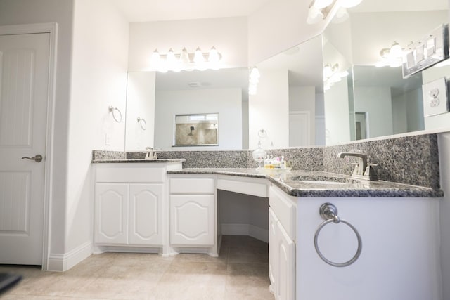 222 Crestview Dr, Midlothian, TX 76065 - bathroom with baseboards, a sink, tile patterned floors, and double vanity