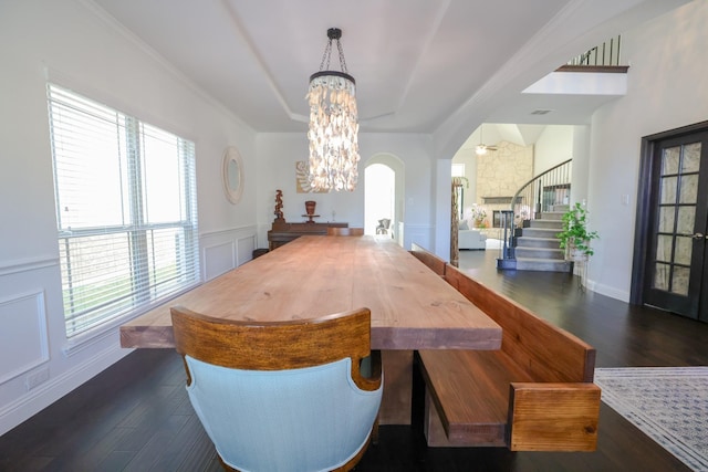222 Crestview Dr, Midlothian, TX 76065 - dining area with dark wood-style floors, a notable chandelier, plenty of natural light, and stairway